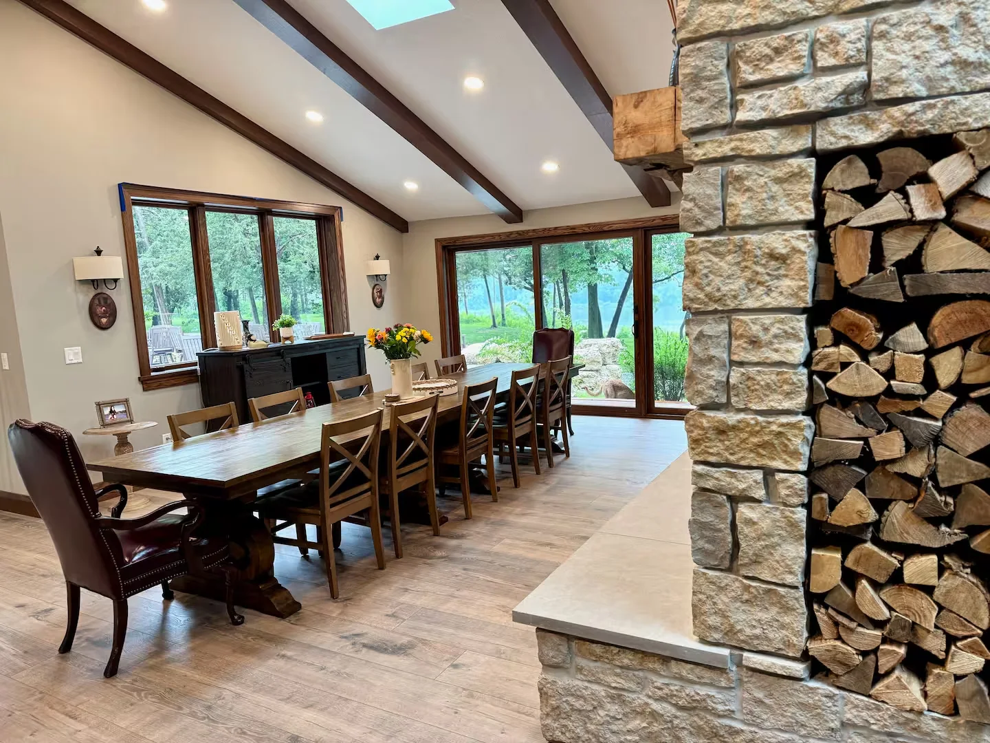 Dining room beside the stone fireplace