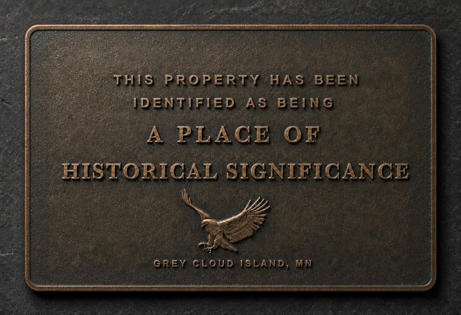 Bronze-style plaque reading: This property has been identified as being a place of historical significance. Grey Cloud Island, Minnesota. An eagle appears beneath the inscription.